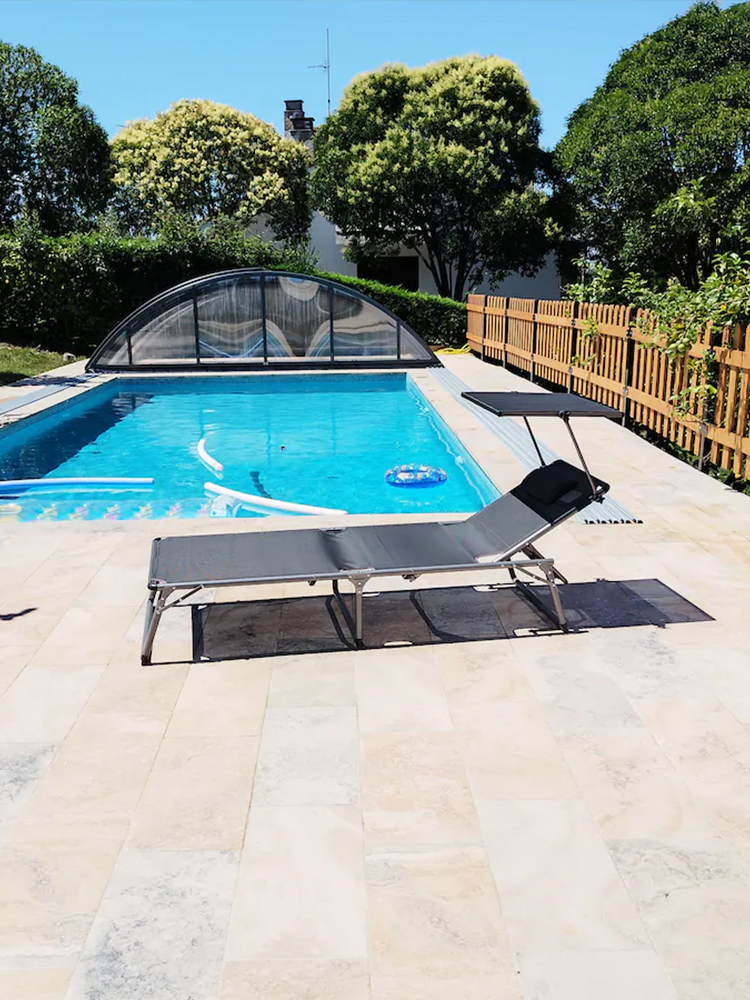 Workers performing balcony repair work on concrete floor
